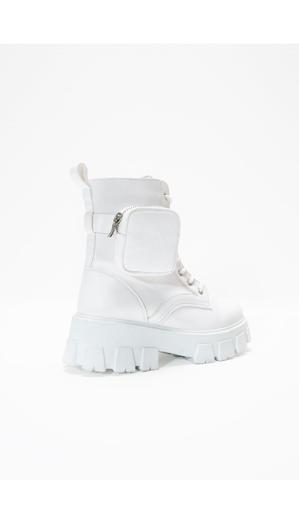 Botin suela track con detalle en capella