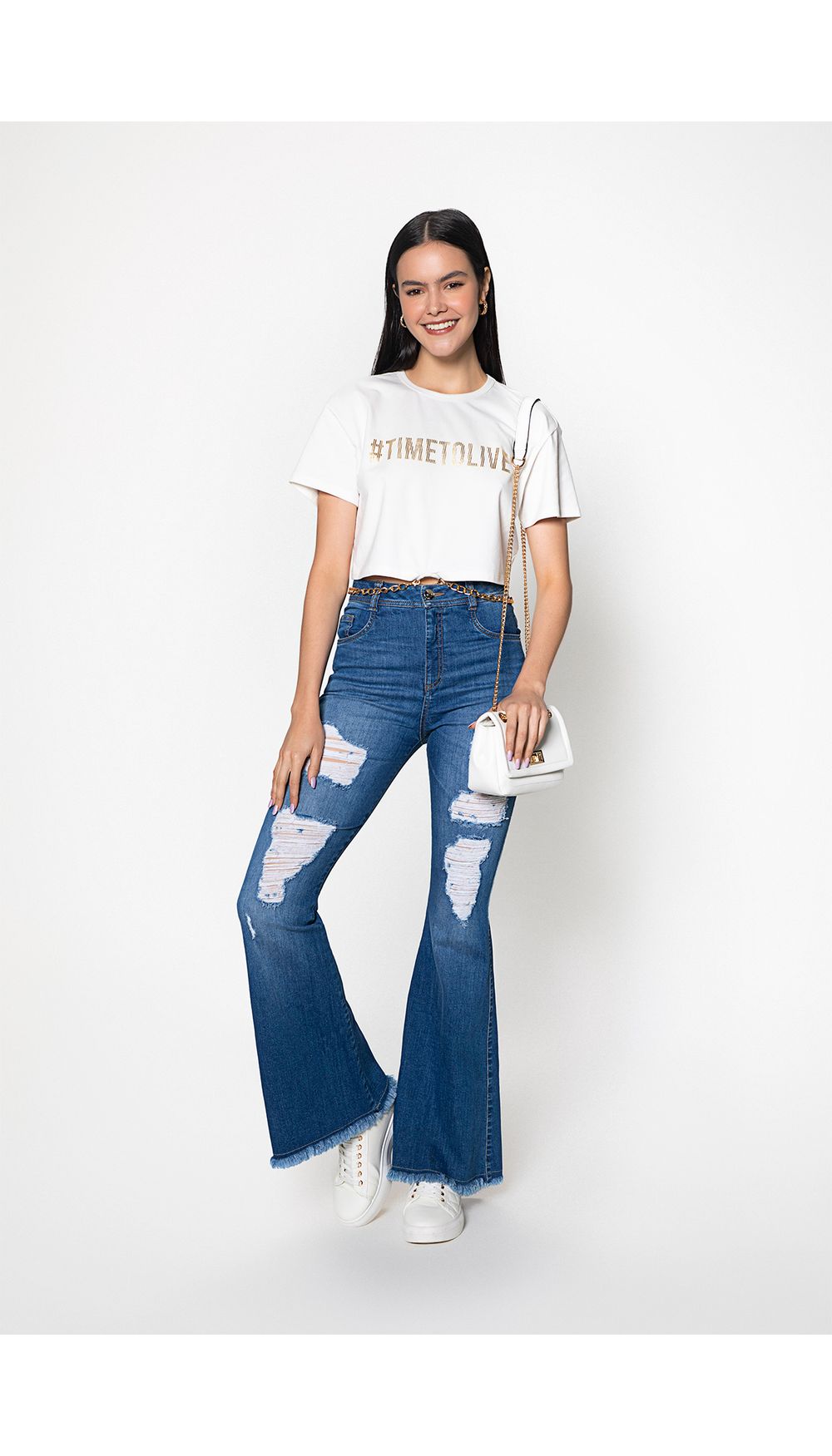 Jeans campana tiro alto con destroyer y