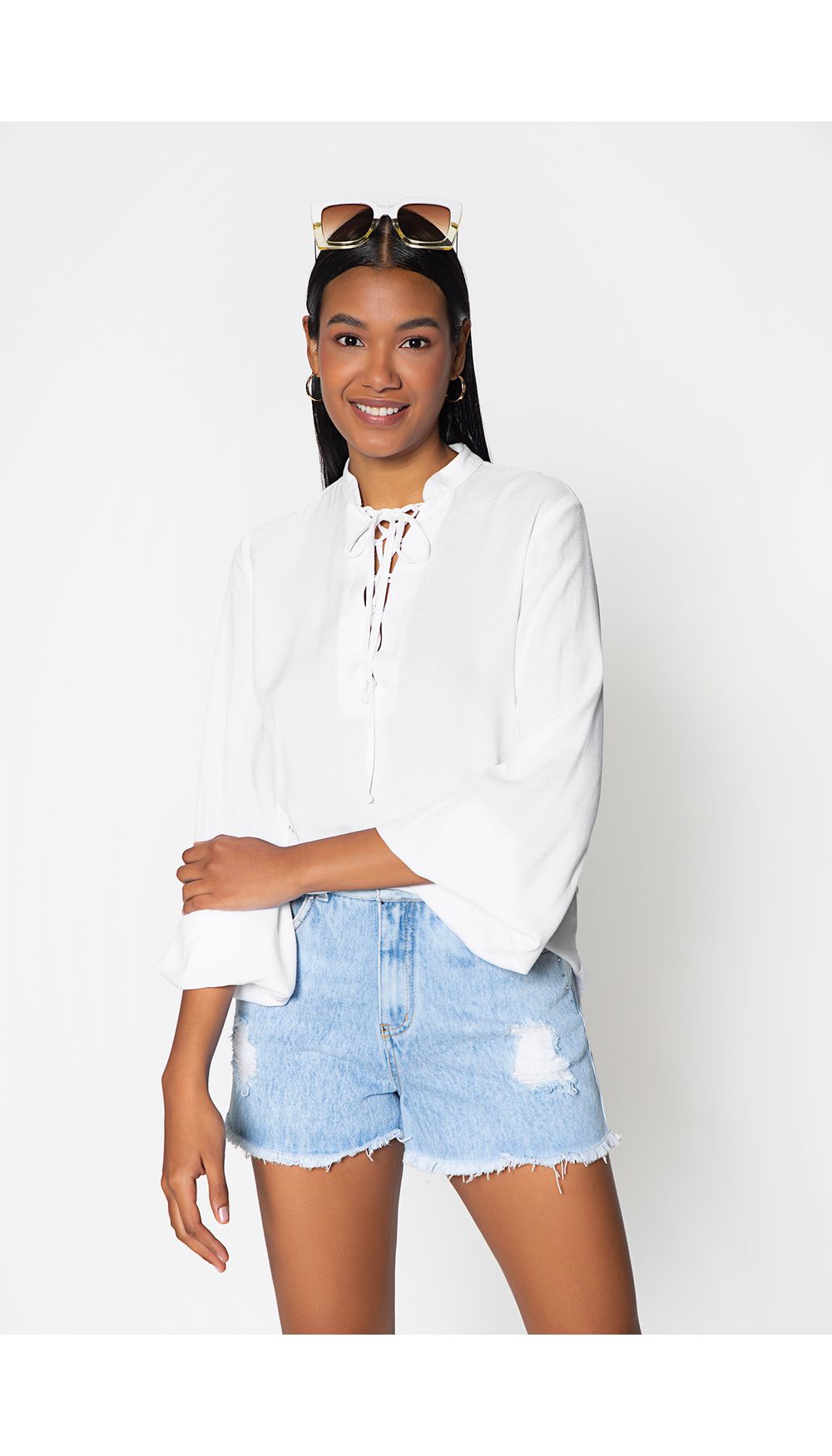 Blusa manga larga con volumen y detalle