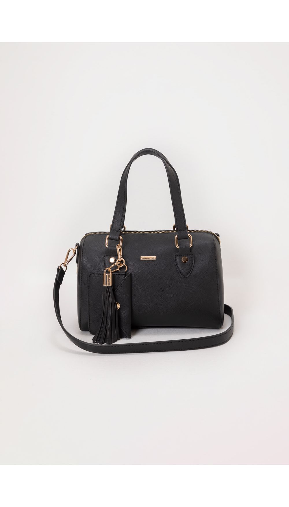 Bolso tipo baúl pequeño con sobre y borl