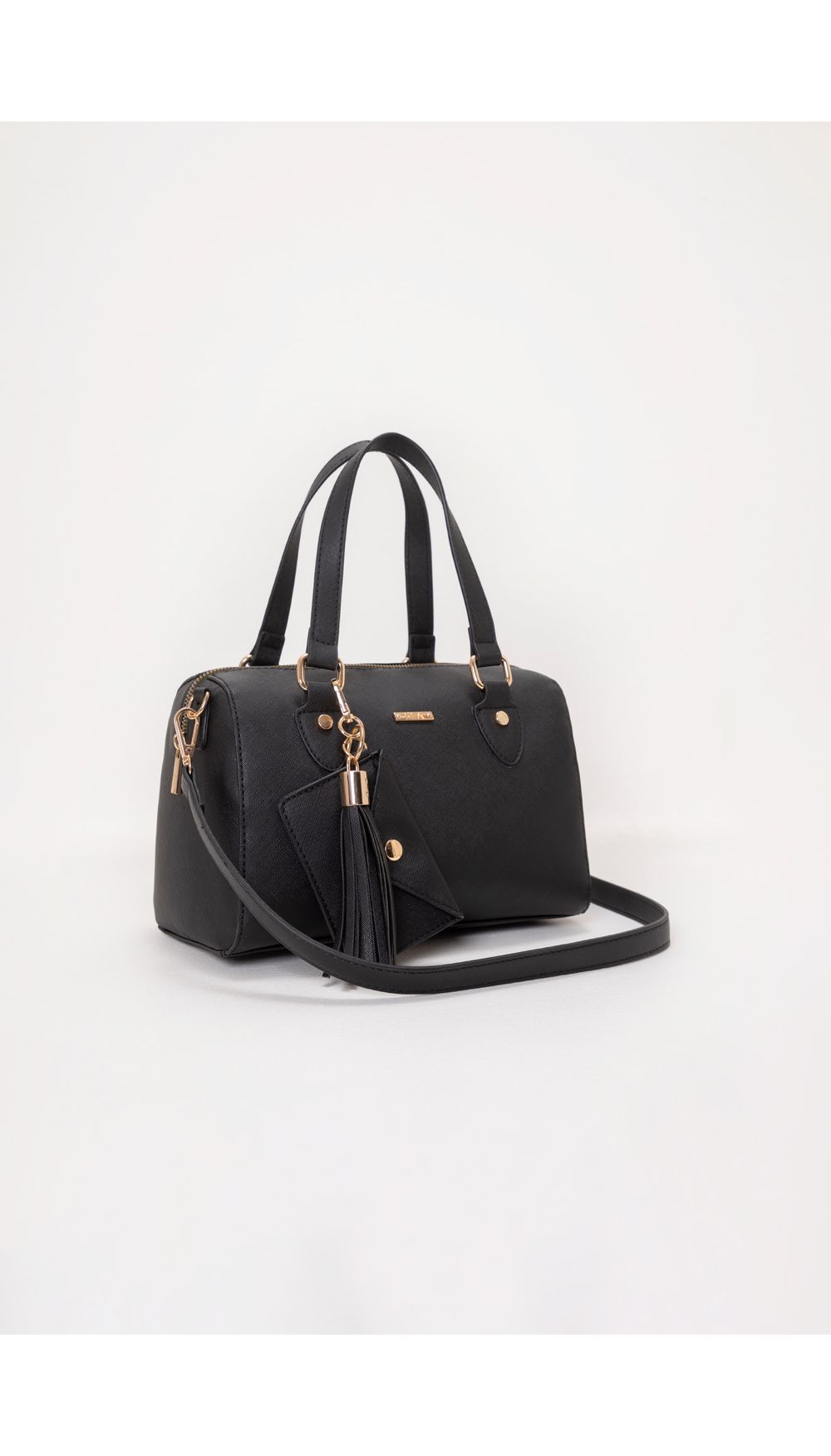 Bolso tipo baúl pequeño con sobre y borl