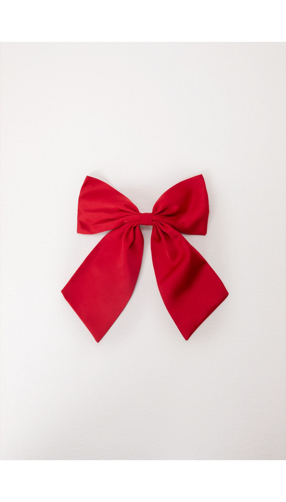 Accesorio para pelo en forma de moño