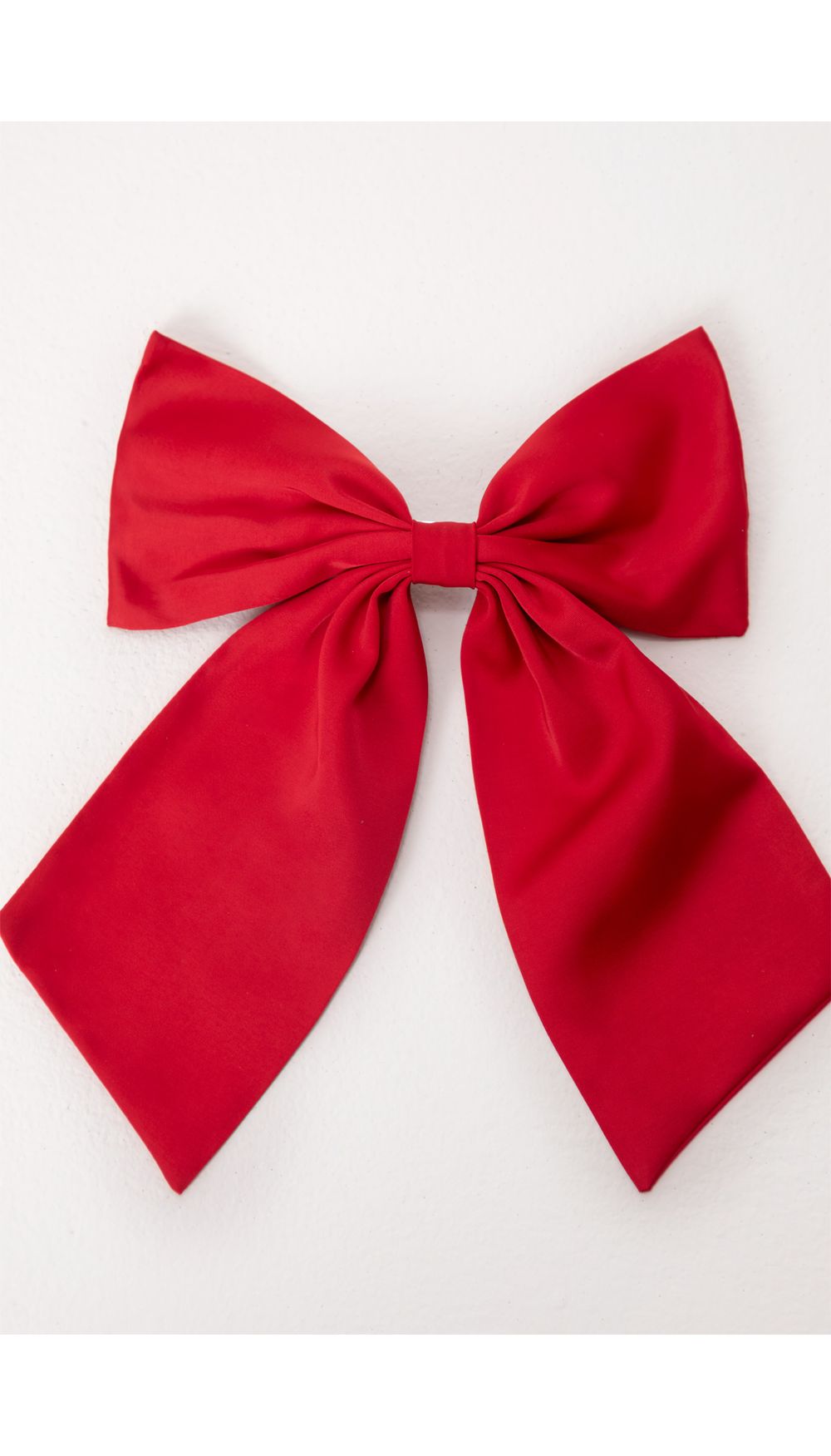 Accesorio para pelo en forma de moño