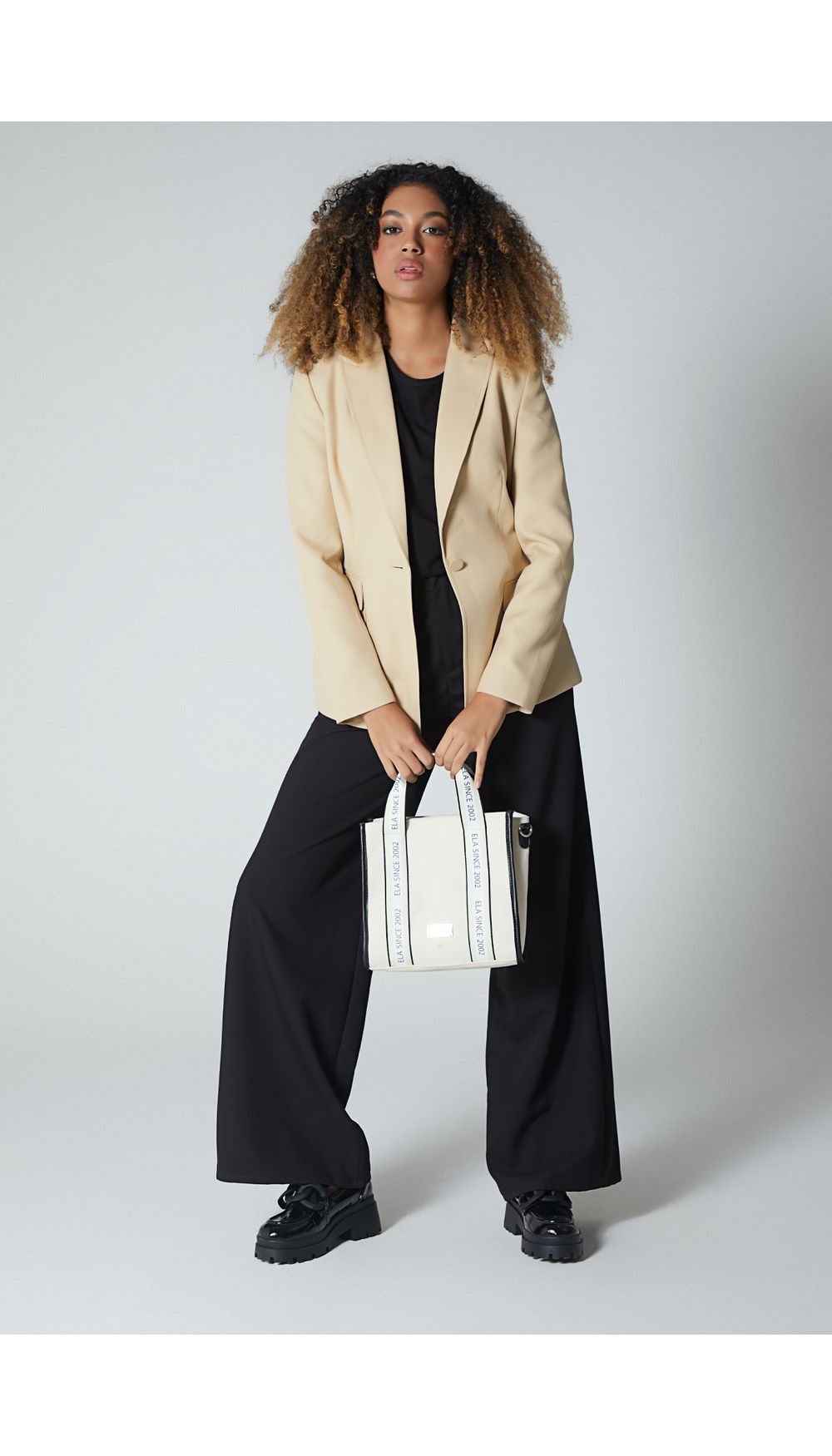 Blazer manga larga con doble bolsillo en