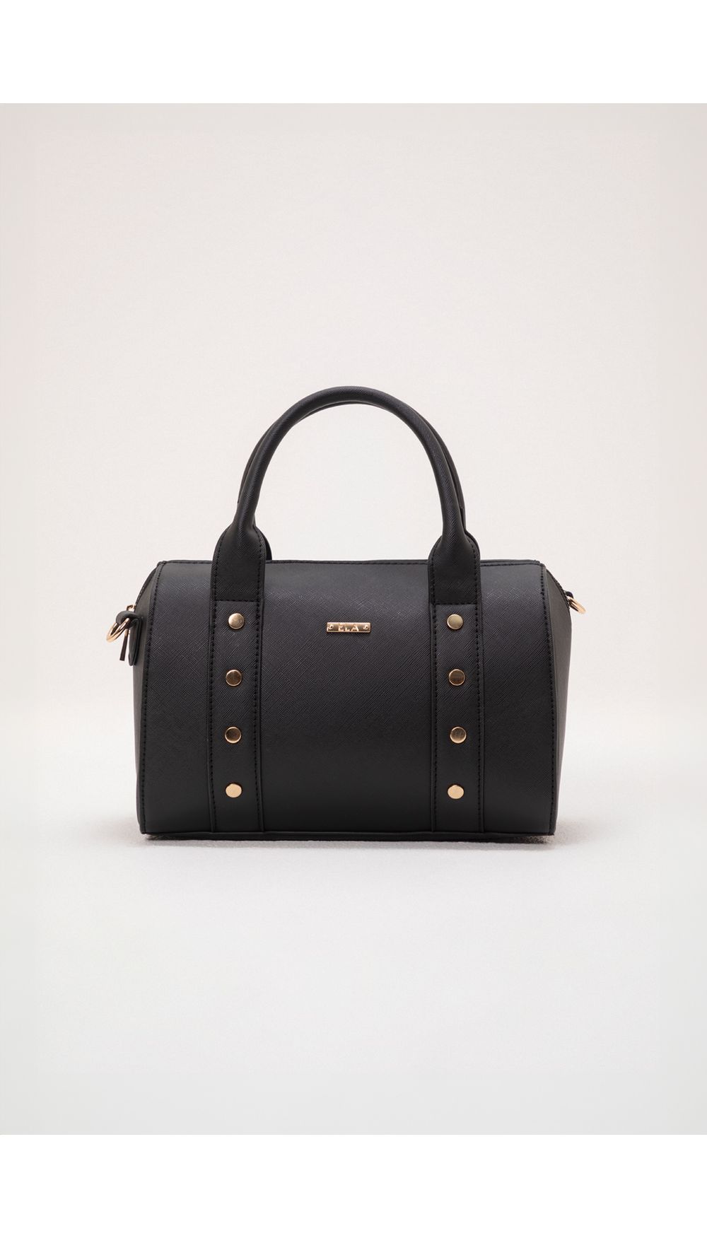 Bolso de mano taches y herraje