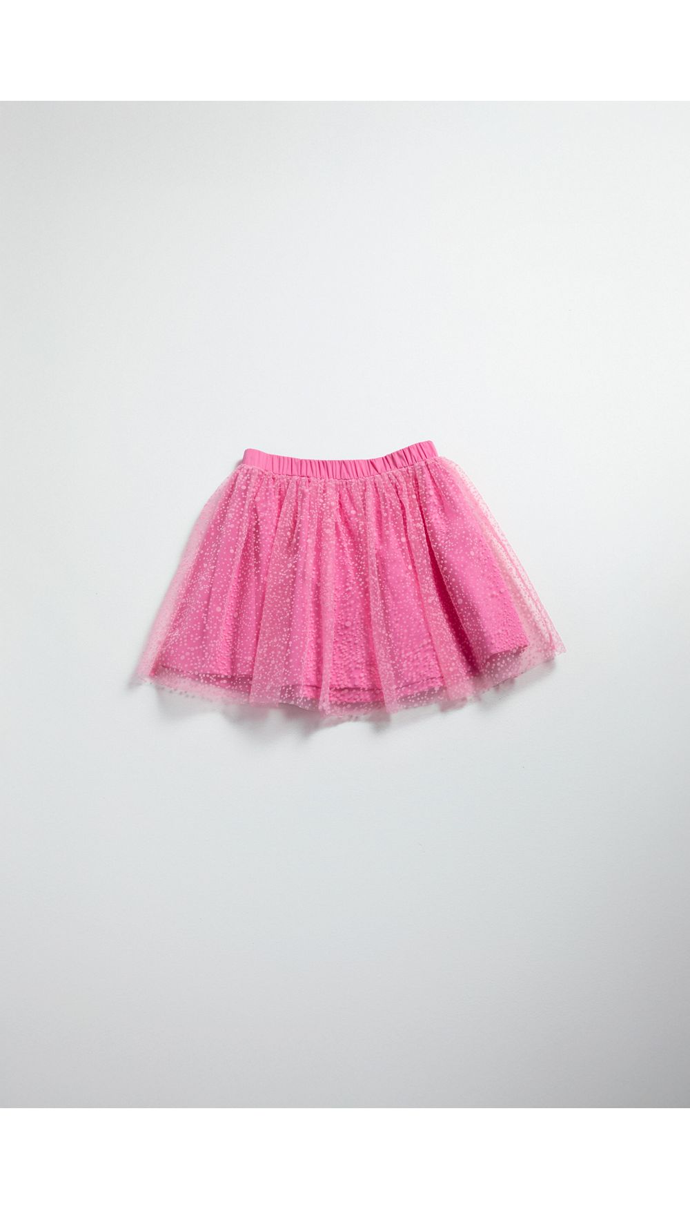 Falda niña plisada con elástico en cintura.