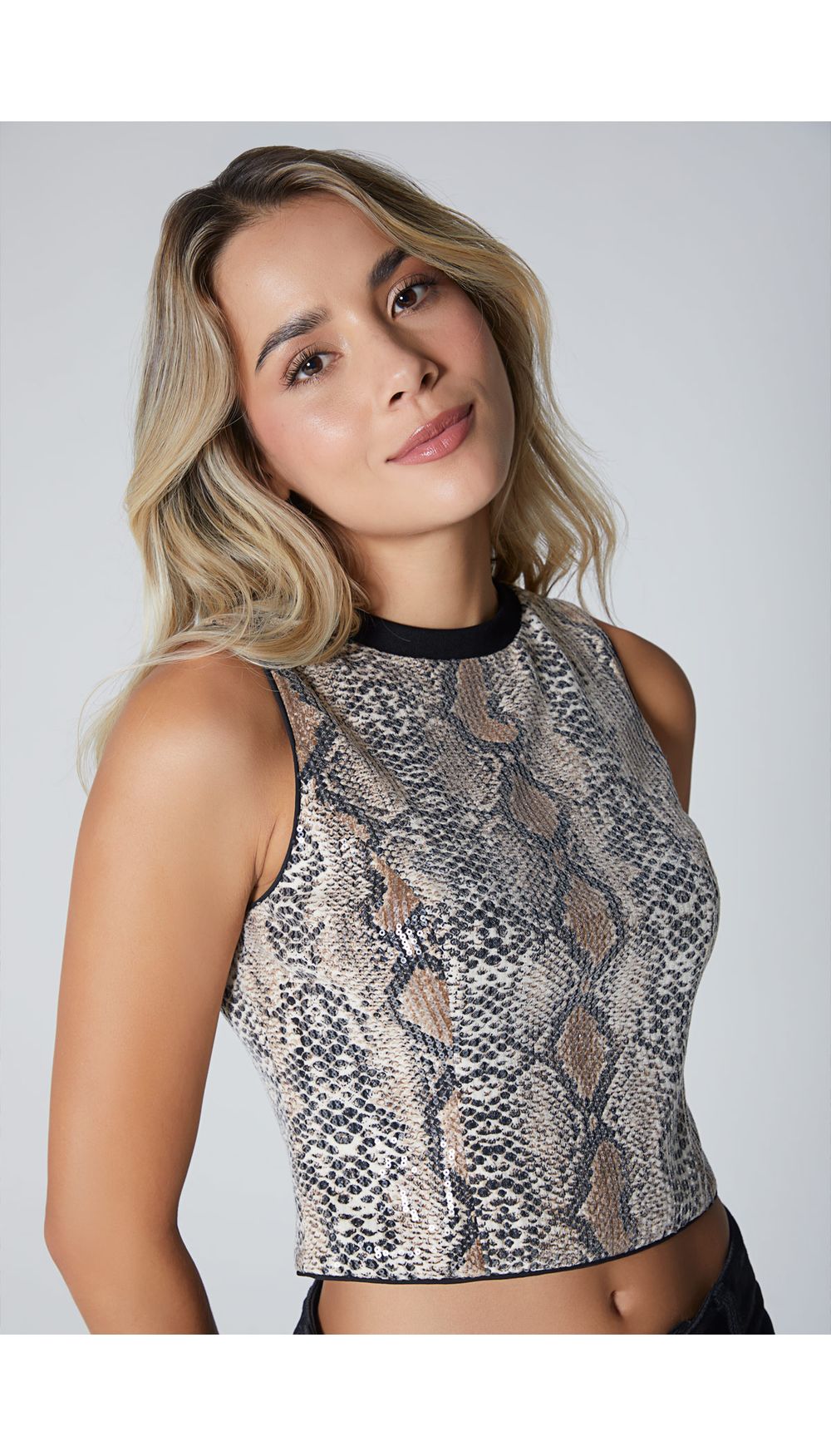 Blusa manga sisa en lentejuela con rib e
