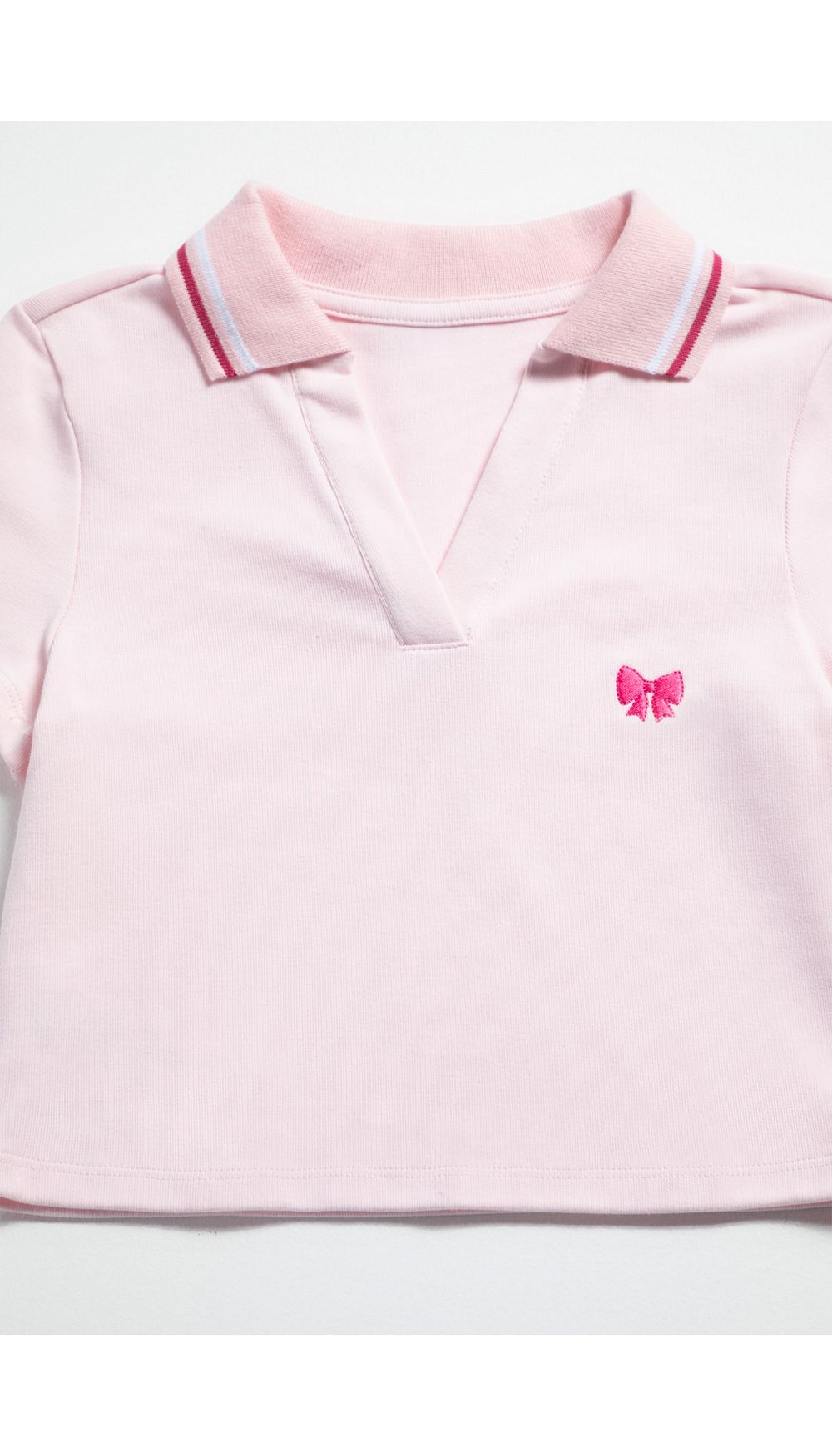 Blusa tipo polo para niña