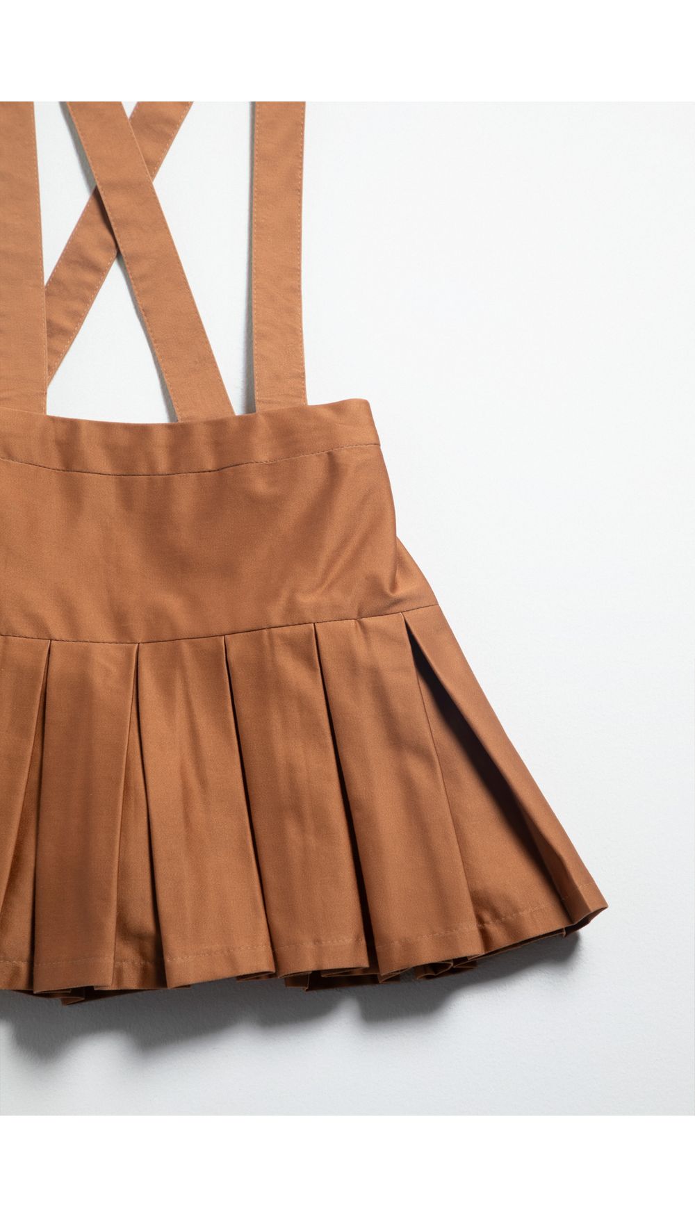 Enterizo falda short con tablones y agar