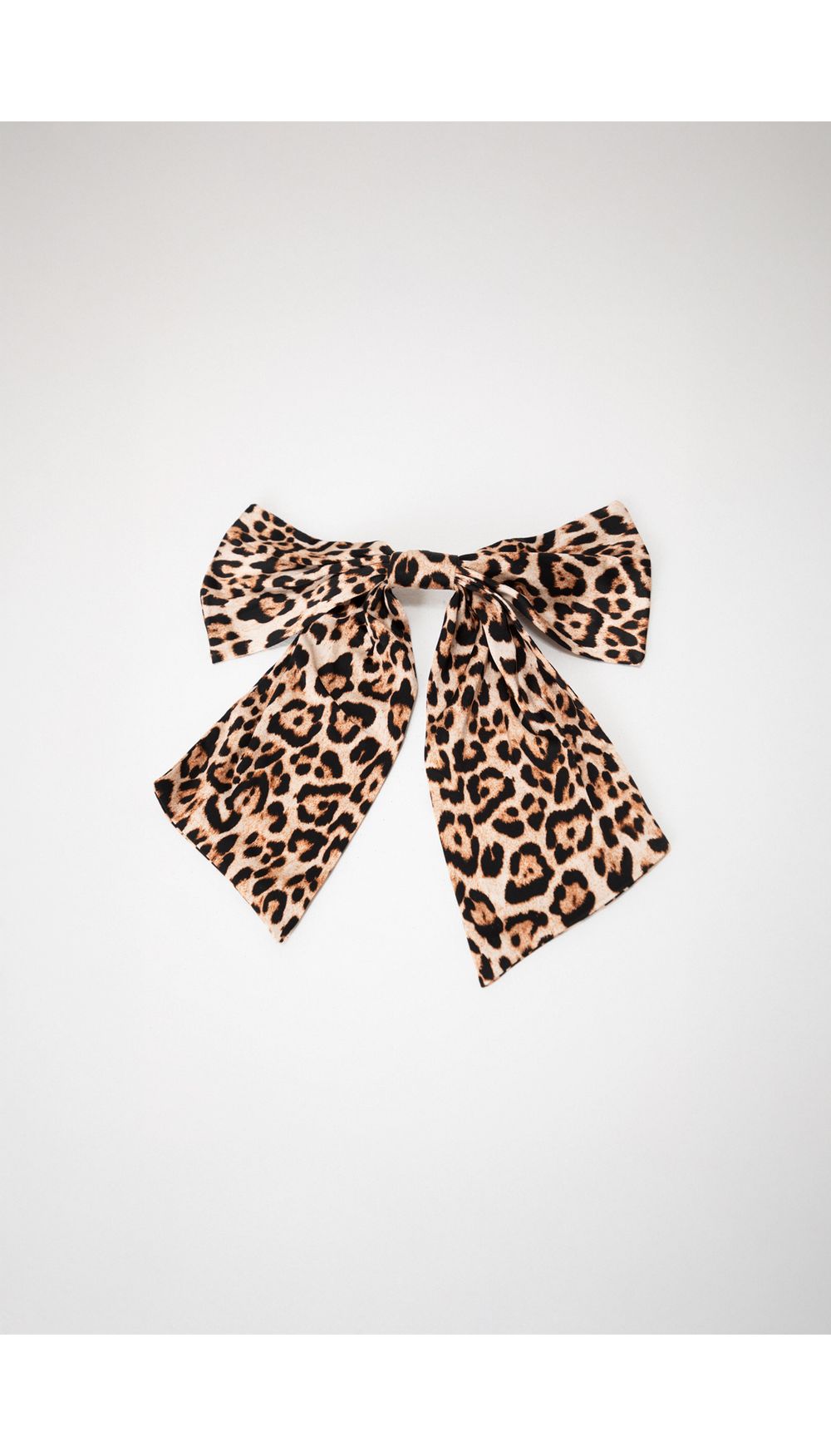 Accesorio para pelo en forma de moño