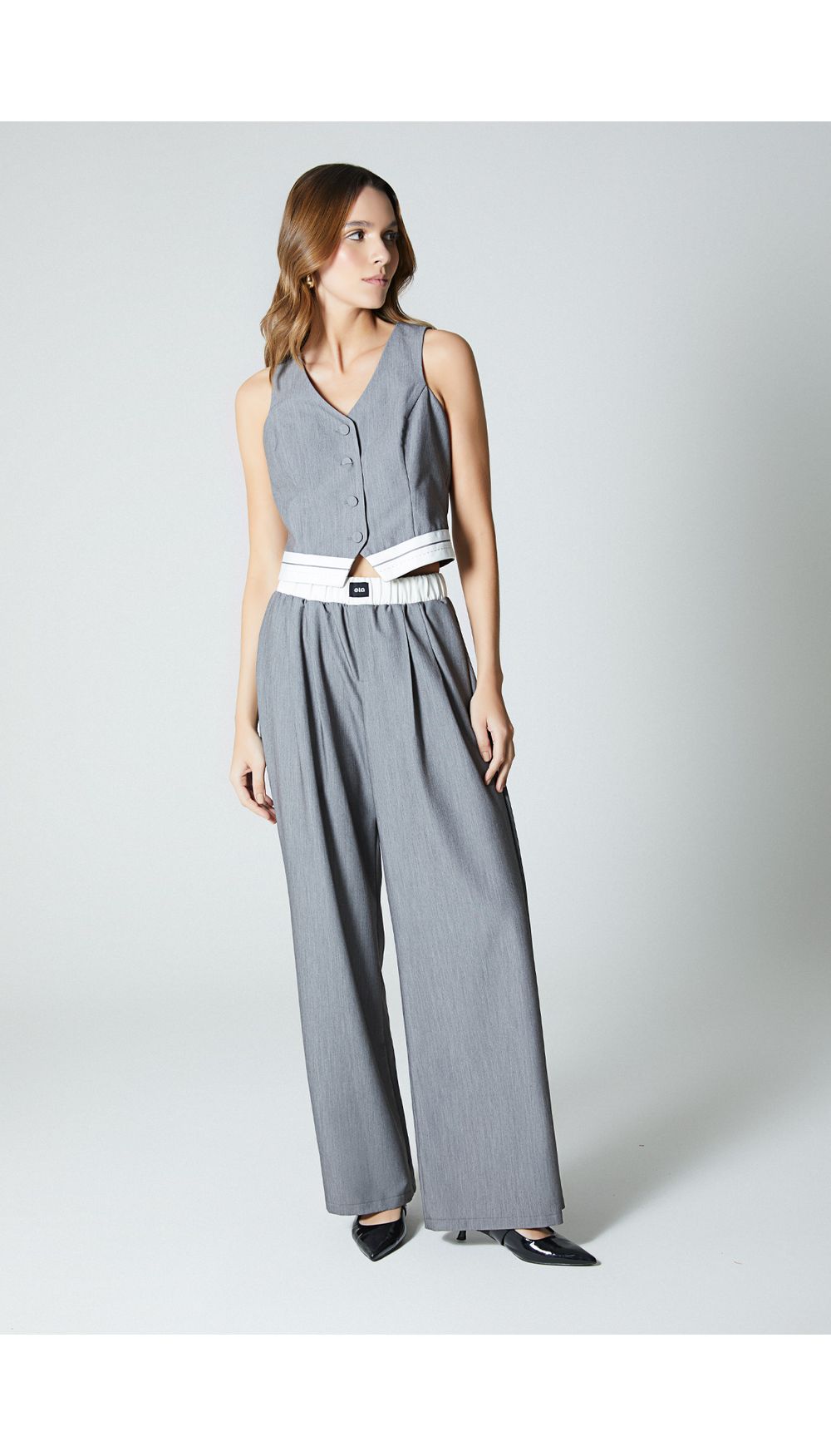 Chaleco crop con botones frontales para mujer