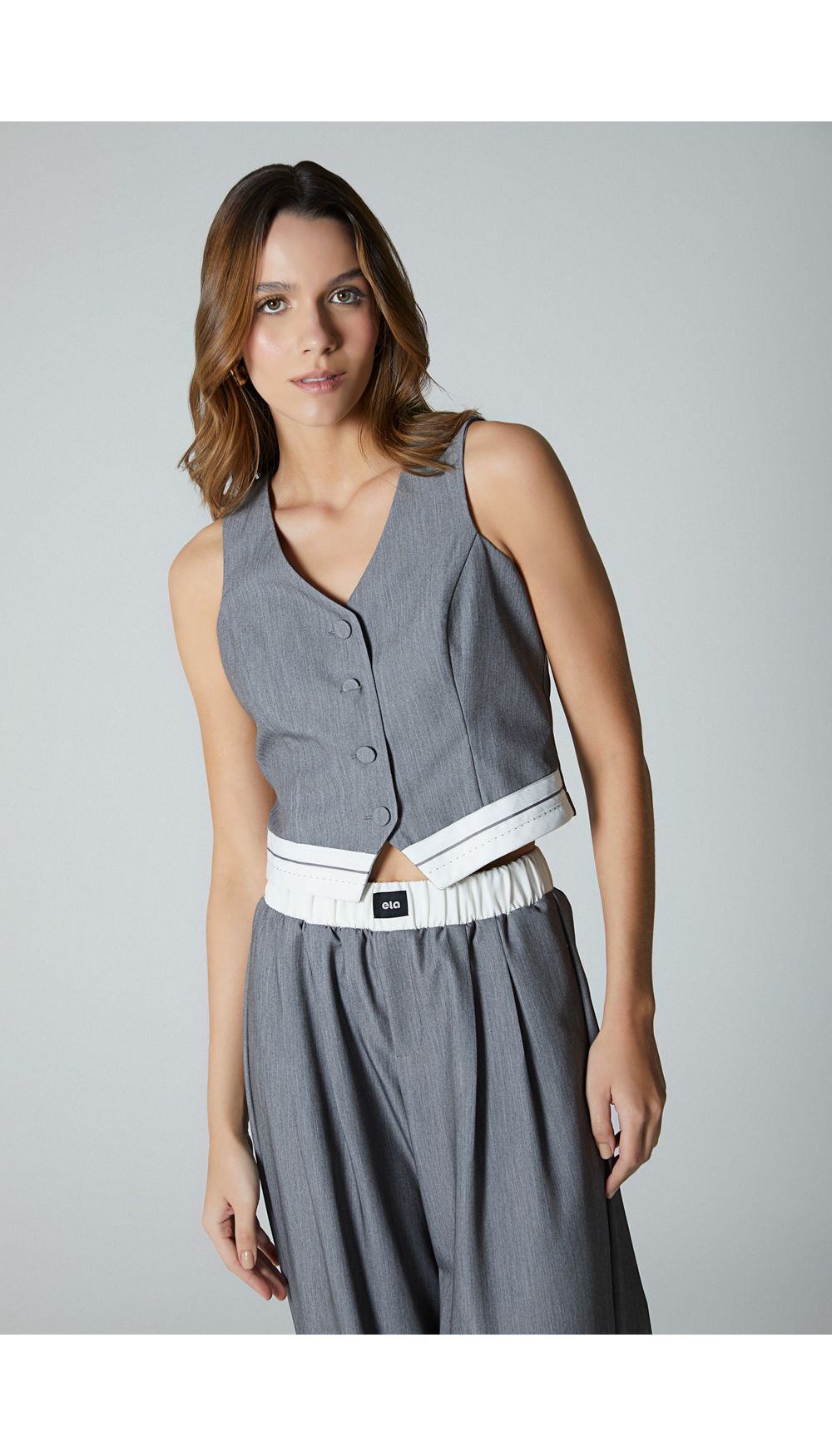 Chaleco crop con botones frontales para mujer