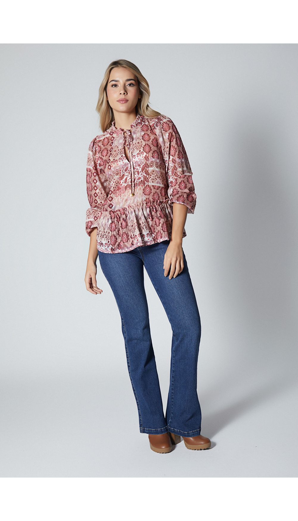 Blusa estampada con peplum