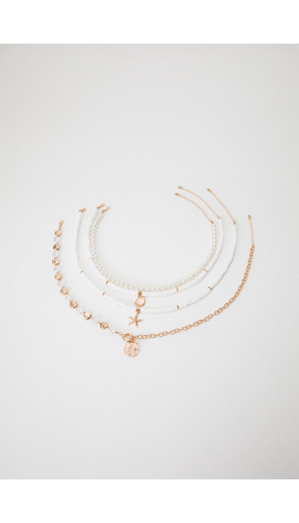 Collar perlas y estrella