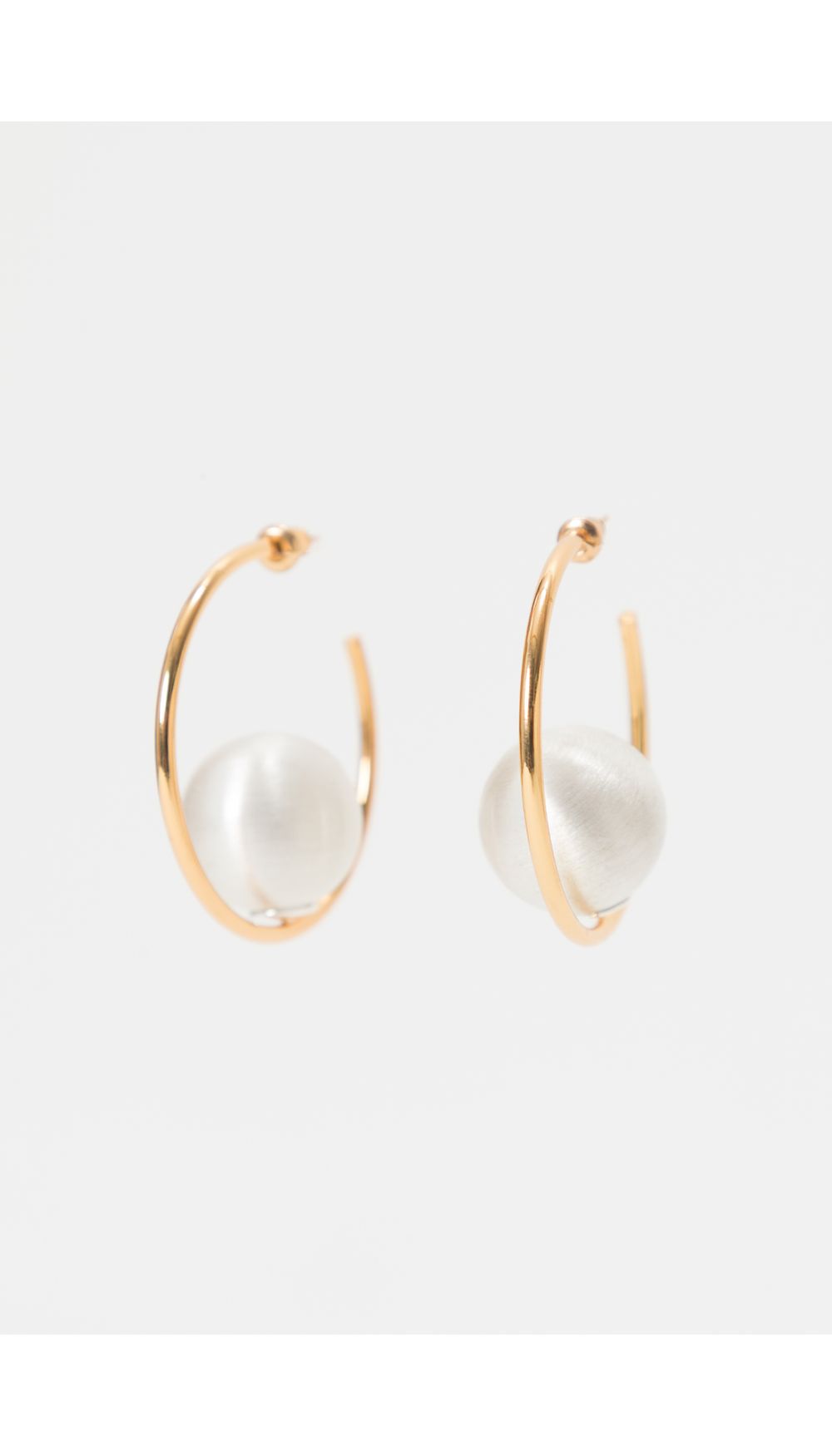 Arete con perlas grandes