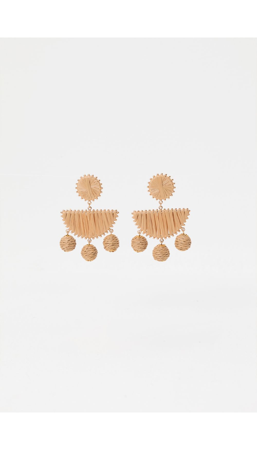 Aretes organicos con borlas