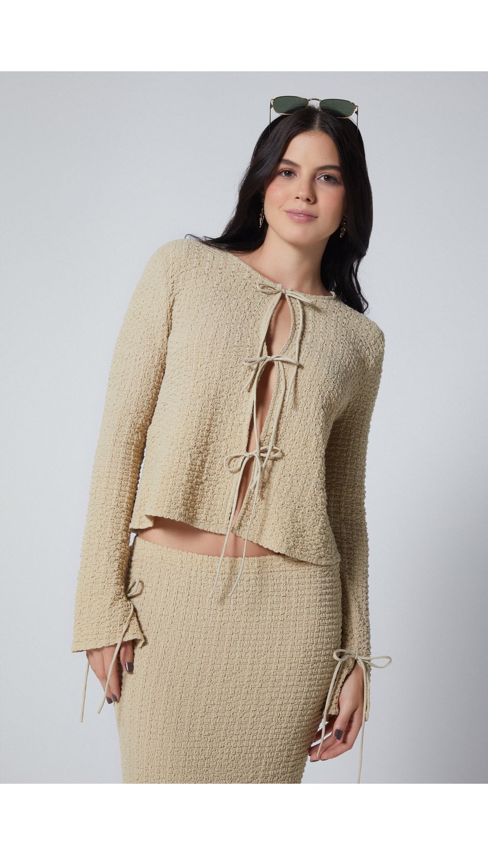 Blusa manga larga con anudados para mujer