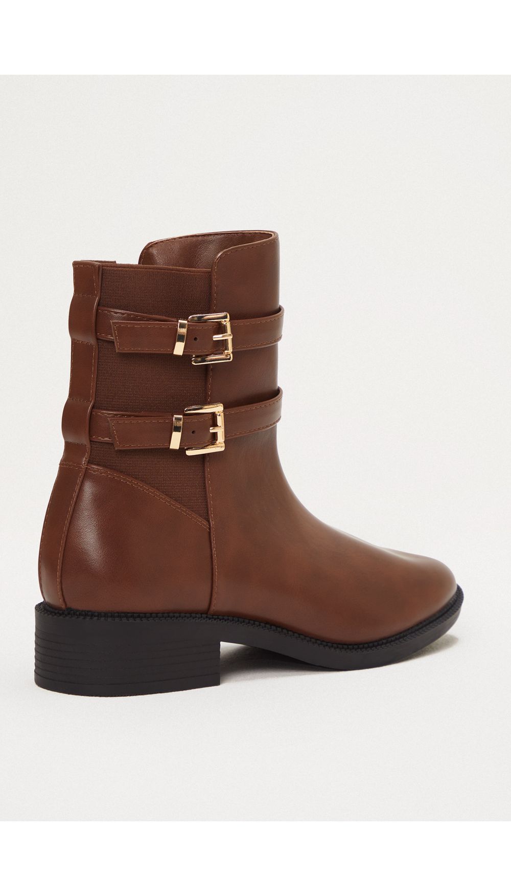 Botin con laterales elasticos y hebillas