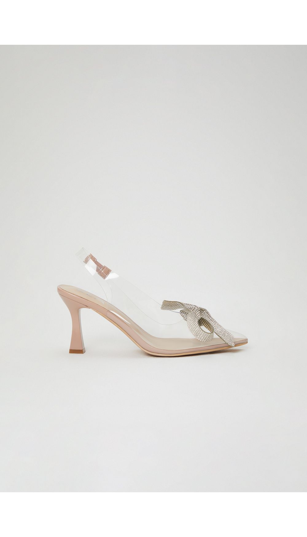 Stiletto vinilo con moño brillante