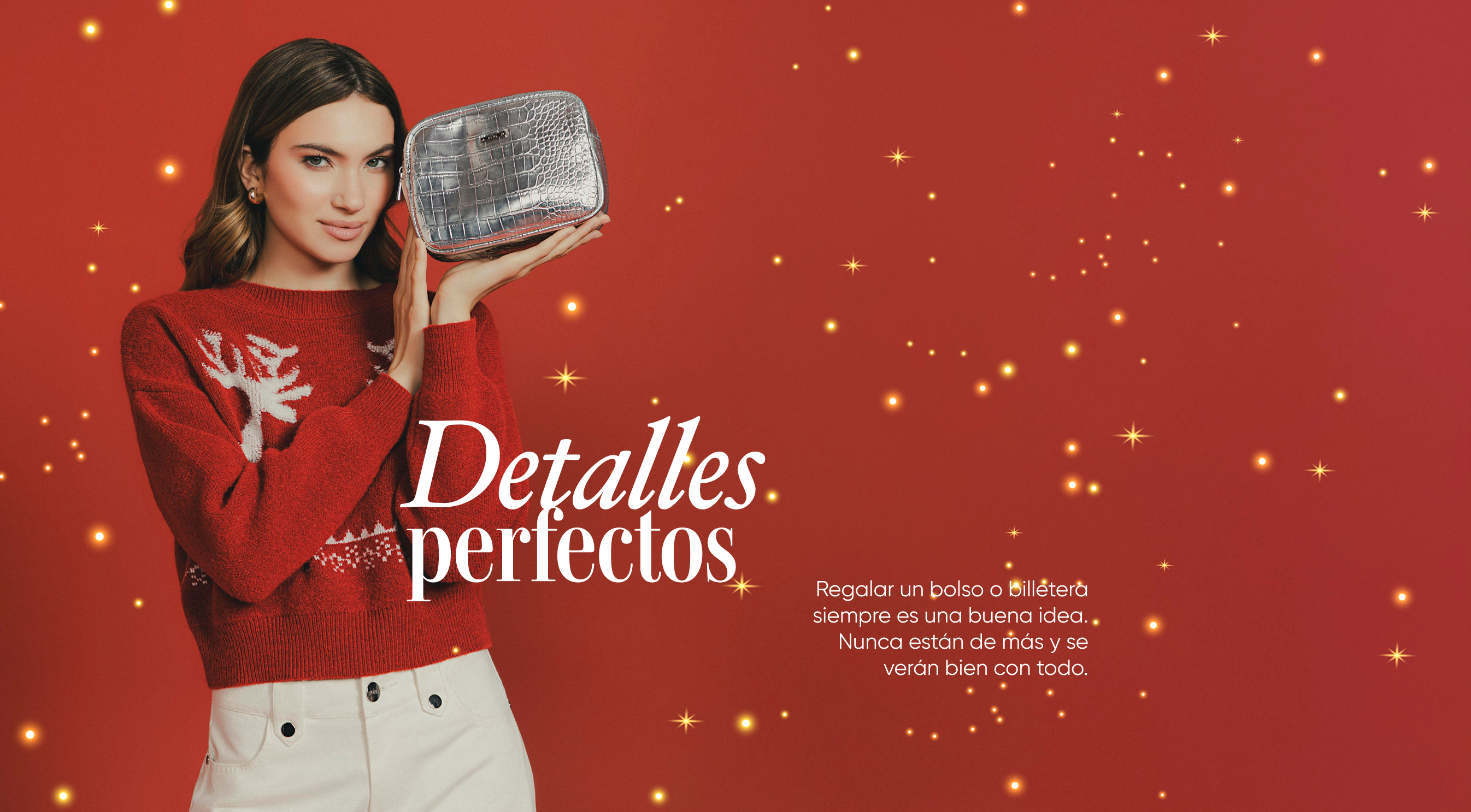 Modelo con suéter rojo navideño y bolso plateado pequeño, detalle perfecto para regalar en esta navidad